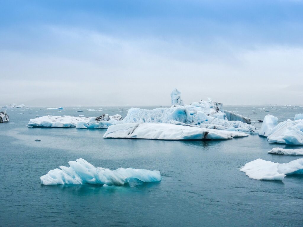 Current image: Serene view of icebergs floating in the calm waters of Jokulsarlon Lagoon, Iceland.
